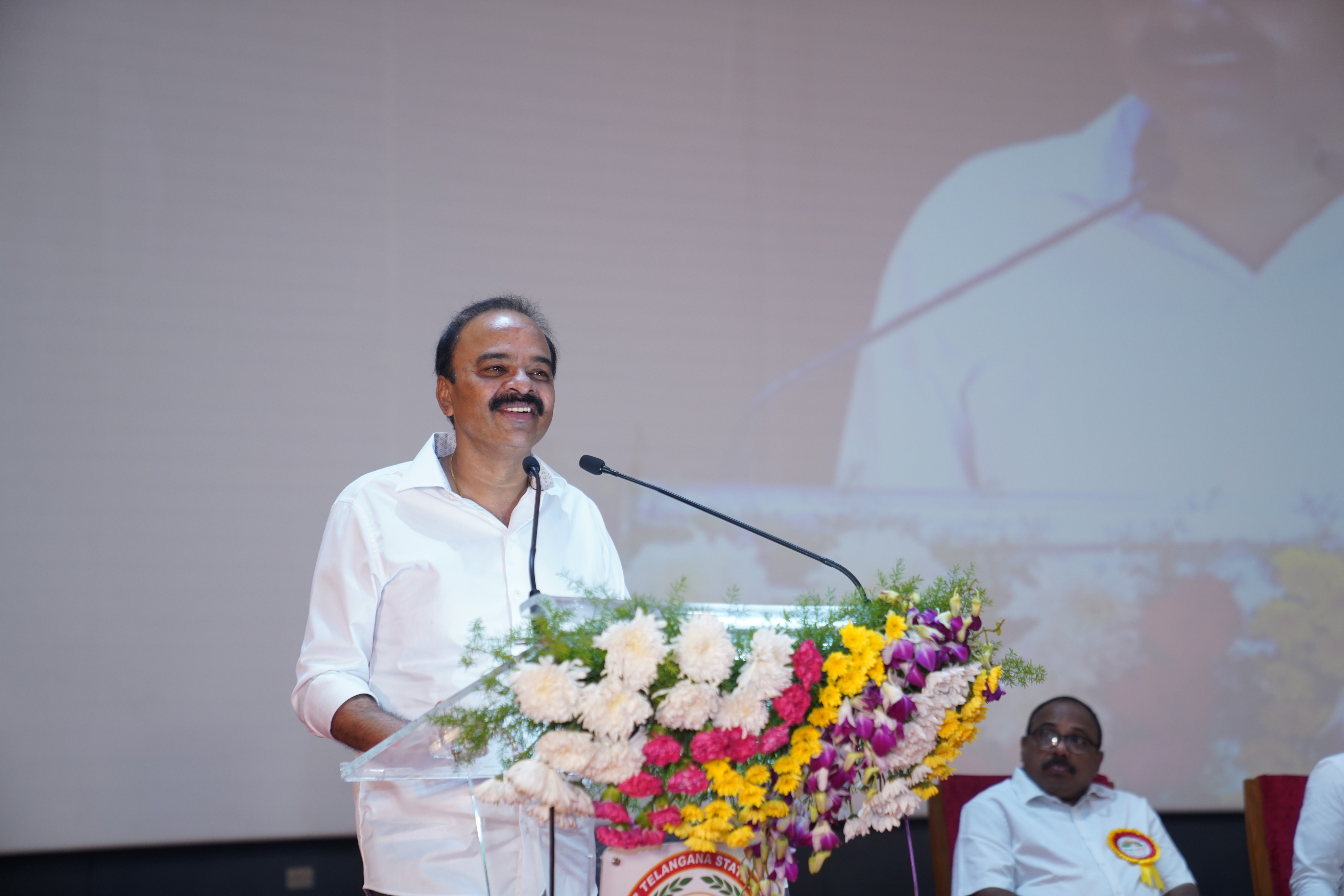Chief Guest Dr. Gaddam Ranjith Reddy, Member of Parliament from Chevella, addressing the Eruvaaka Foundation Annual Awards ceremony at PJTSAU